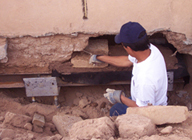 The wall is rebuilt over the basket.